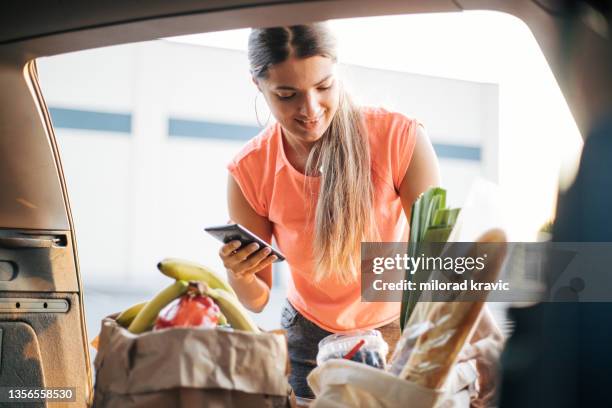 shopping - shopping bags car boot stock pictures, royalty-free photos & images