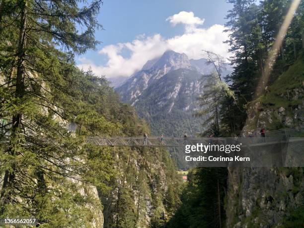 hiking trail through 'leutascher geisterklamm', seefeld, tyrol, austria - seefeld stock pictures, royalty-free photos & images