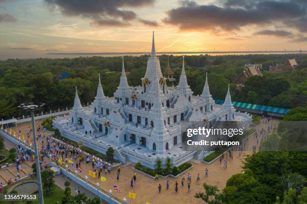 aerial view of visakabucha day, there is traditionally lighting of candle, circumambulation and meditation to pay homage to the lord buddha, at asokaram temple - vientiane stock pictures, royalty-free photos & images