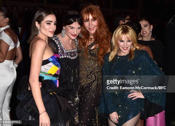 Olivia Culpo, guest, Charlotte Tilbury and Kylie Minogue attend The Fashion Awards 2021 at Royal Albert Hall on November 29, 2021 in London, England.