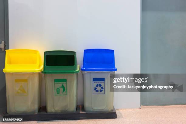 colourfull recycle bins in event hall. - mixed recycling bin stock pictures, royalty-free photos & images