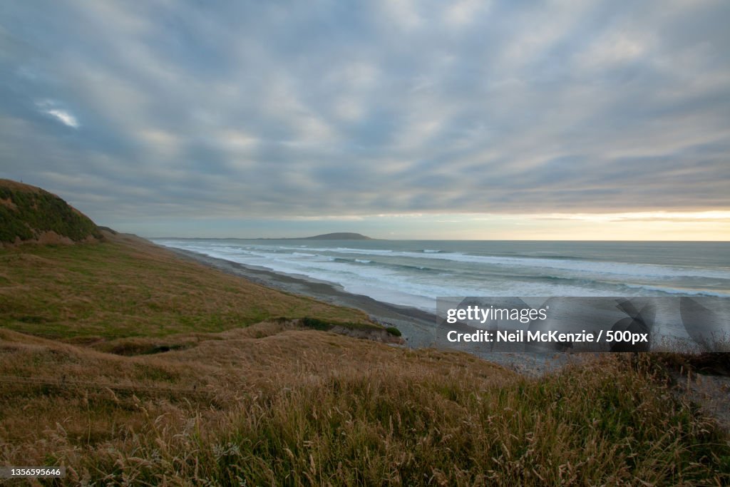 South Coast,Scenic view of sea against sky,Te Waewae Bay,Southland,New Zealand