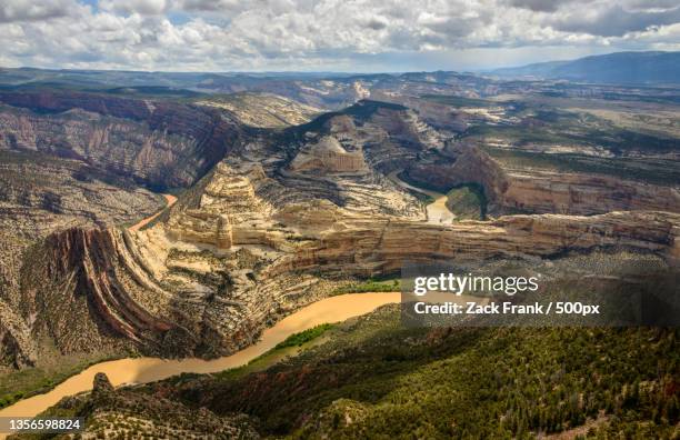 dinosaur national monument,aerial view of landscape against cloudy sky - dinosaur national monument stock pictures, royalty-free photos & images