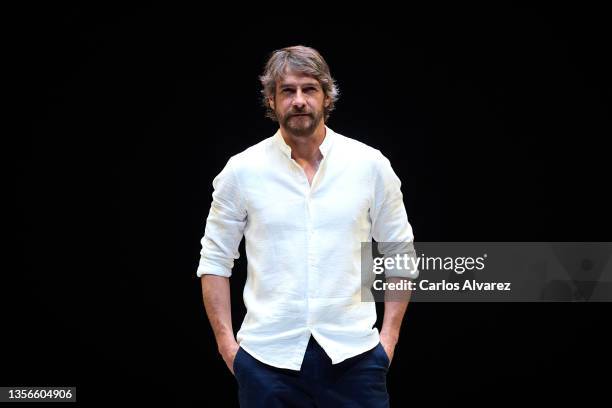 Actor Félix Gómez poses on stage during the 'Una Historia de Amor' theater play at the El Canal Theater on December 01, 2021 in Madrid, Spain.