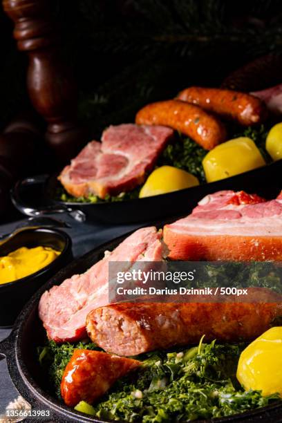 rustic kale with pinkel sausage and kassler - grünkohl stock pictures, royalty-free photos & images