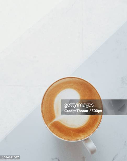 latte in white,high angle view of coffee on table,gia lai,vietnam - coffee heart fotografías e imágenes de stock