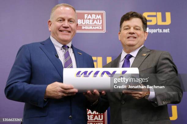 Brian Kelly is introduced as the head football coach of the LSU Tigers by athletics director Scott Woodward during a news conference at Tiger Stadium...