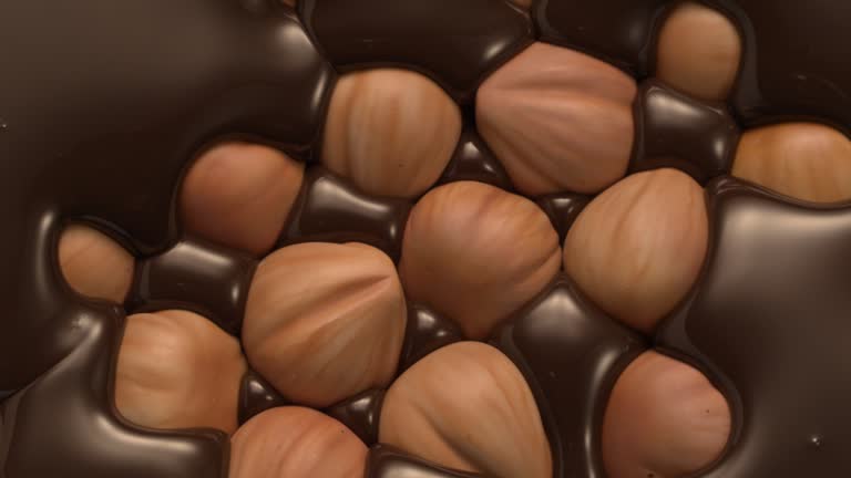 https://media.gettyimages.com/id/1356632500/video/chocolate-coating-hazelnuts.jpg?b=1&s=640x640&k=20&c=yQXMTF20vFcZrsVkSjnnOmVsPUOibp_0PO2326oPpDc=