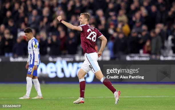 Tomas Soucek of West Ham United celebrates after scoring their side's first goal during the Premier League match between West Ham United and Brighton...
