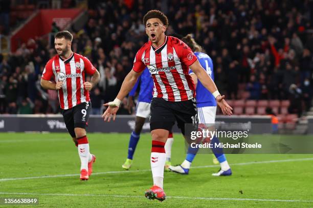 Che Adams of Southampton celebrates after scoring their side's second goal during the Premier League match between Southampton FC and Leicester City...