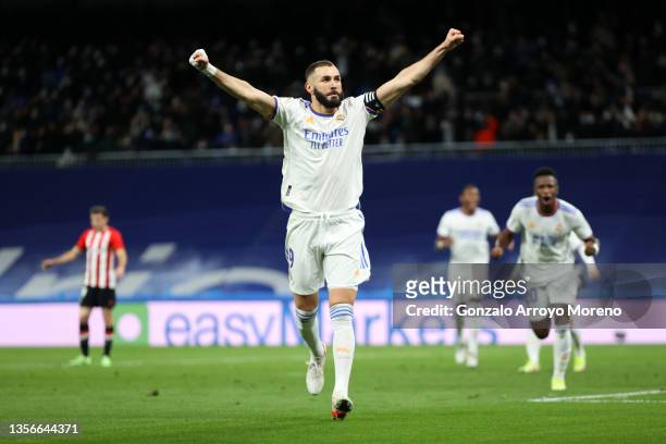 Karim Benzema of Real Madrid celebrates after scoring their team's first goal during the La Liga Santander match between Real Madrid CF and Athletic...