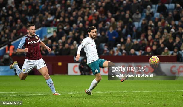 Bernardo Silva of Manchester City scores their side's second goal during the Premier League match between Aston Villa and Manchester City at Villa...