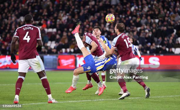 Neal Maupay of Brighton & Hove Albion scores their side's first goal during the Premier League match between West Ham United and Brighton & Hove...