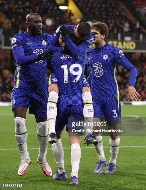 Hakim Ziyech of Chelsea celebrates with teammates Romelu Lukaku and Mason Mount after scoring their side's second goal during the Premier League...