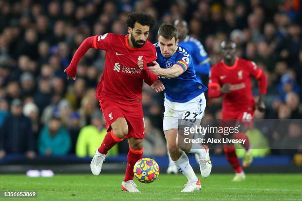 Mohamed Salah of Liverpool breaks away from Seamus Coleman of Everton during the Premier League match between Everton and Liverpool at Goodison Park...