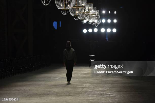 Model at rehearsal at backstage at Hakan Akkaya x Cinderella Bridal Capsule Collection at Tersane Istanbul on November 30, 2021 in Istanbul, Turkey.