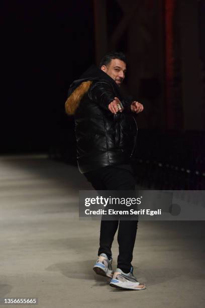 Serkan Duman poses backstage at Hakan Akkaya x Cinderella Bridal Capsule Collection at Tersane Istanbul on November 30, 2021 in Istanbul, Turkey.