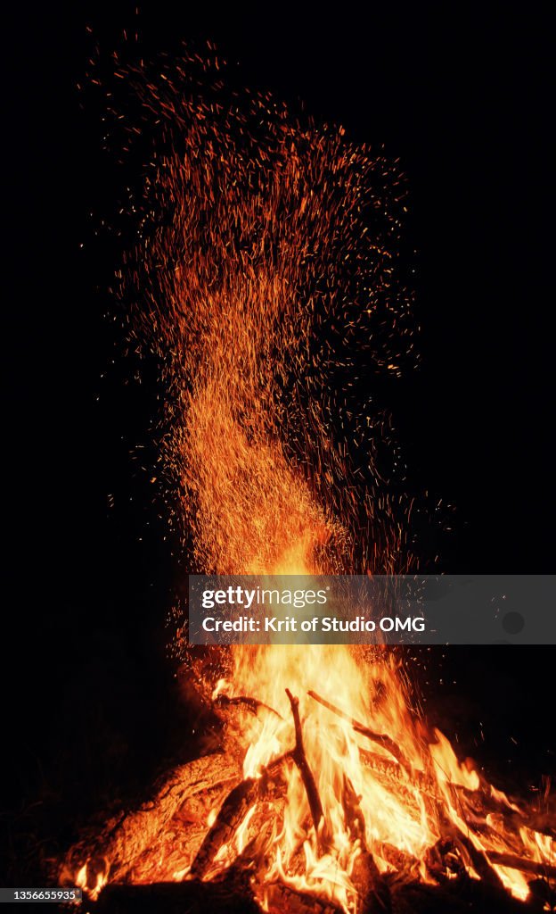 Flame and spark on the fireplace