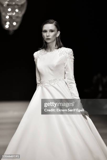 Model walks the runway at Hakan Akkaya x Cinderella Bridal Capsule Collection at Tersane Istanbul on November 30, 2021 in Istanbul, Turkey.