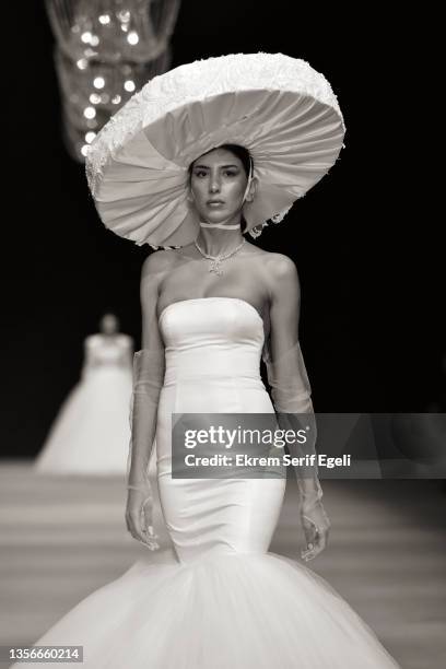 Model walks the runway at Hakan Akkaya x Cinderella Bridal Capsule Collection at Tersane Istanbul on November 30, 2021 in Istanbul, Turkey.