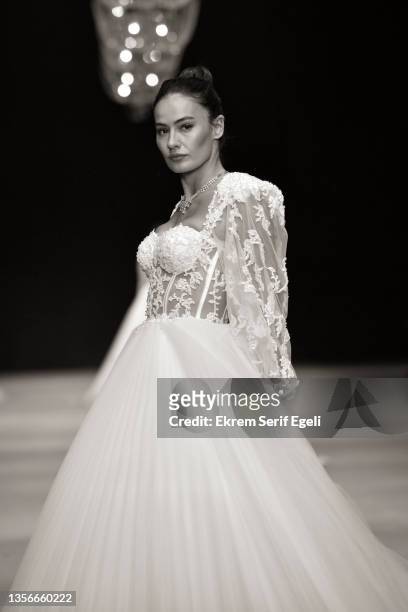 Model walks the runway at Hakan Akkaya x Cinderella Bridal Capsule Collection at Tersane Istanbul on November 30, 2021 in Istanbul, Turkey.