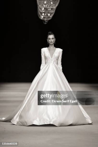 Model walks the runway at Hakan Akkaya x Cinderella Bridal Capsule Collection at Tersane Istanbul on November 30, 2021 in Istanbul, Turkey.