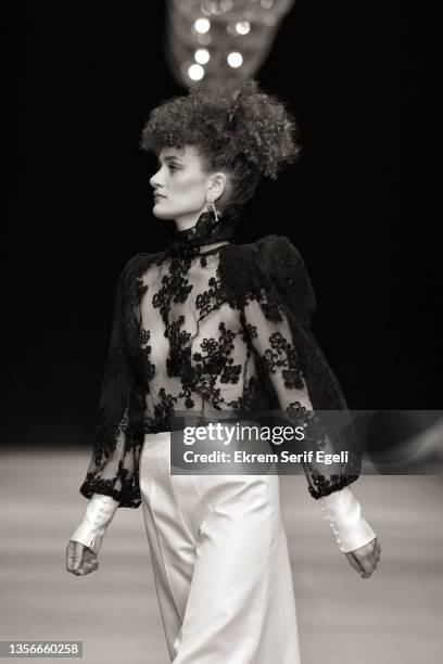 Model walks the runway at Hakan Akkaya x Cinderella Bridal Capsule Collection at Tersane Istanbul on November 30, 2021 in Istanbul, Turkey.