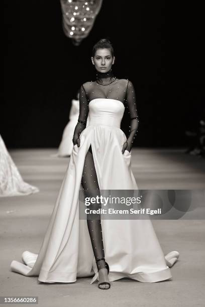 Model walks the runway at Hakan Akkaya x Cinderella Bridal Capsule Collection at Tersane Istanbul on November 30, 2021 in Istanbul, Turkey.