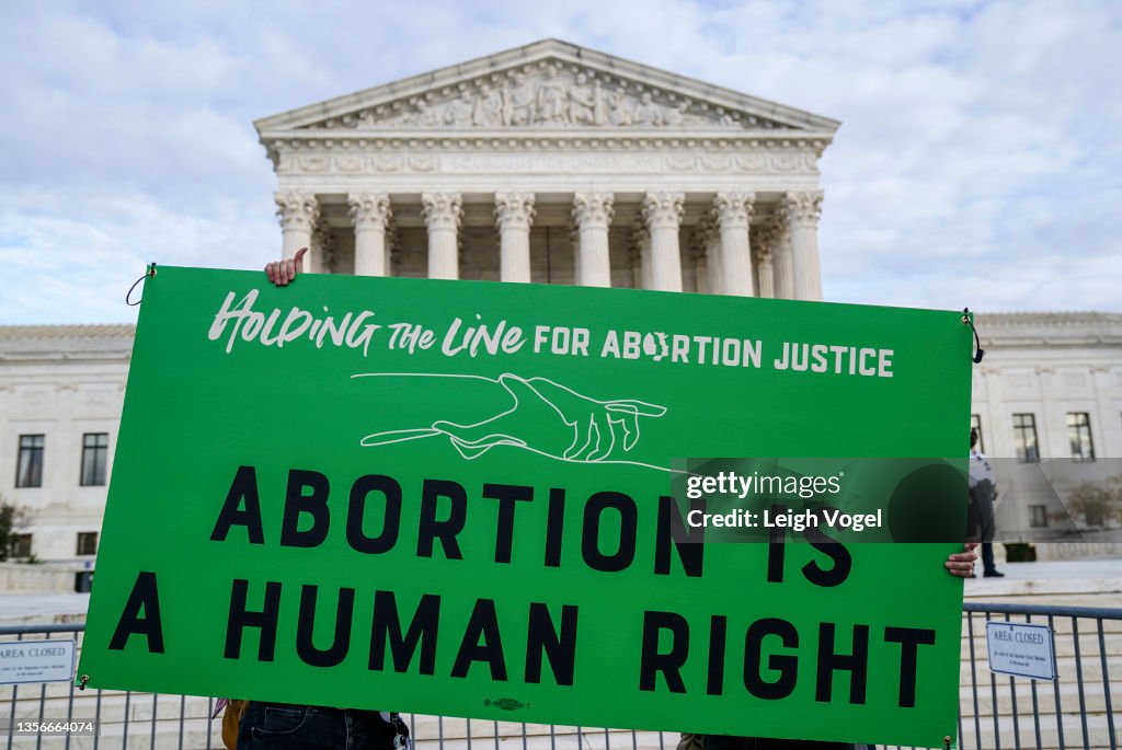 Women's March "Hold The Line For Abortion Justice" At The Supreme Court During Jackson Women's Health Organization v. Dobbs Hearing