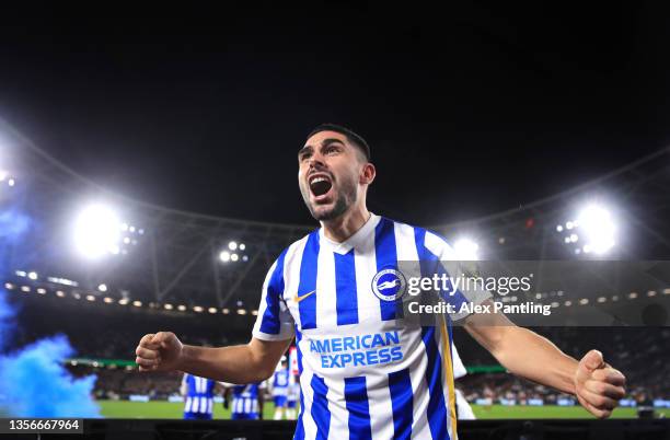 Neal Maupay of Brighton celebrates after scoring his sides first goal during the Premier League match between West Ham United and Brighton & Hove...