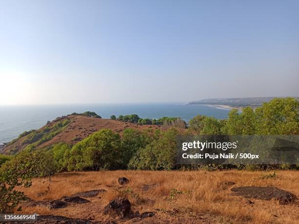 scenic view of sea against clear sky,chapora fort trail,india - chapora fort stock pictures, royalty-free photos & images
