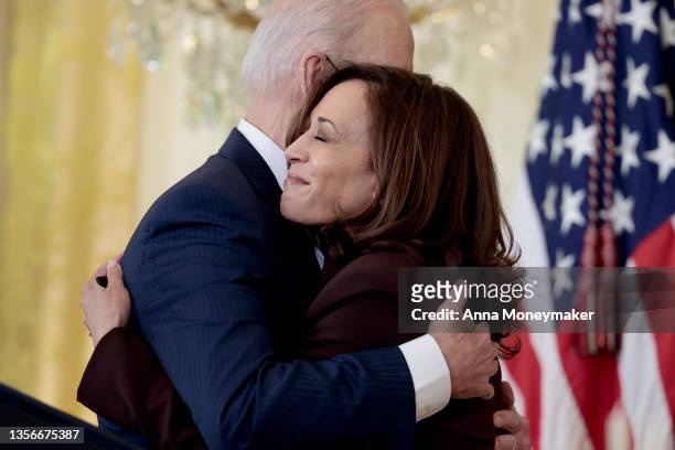 Kamala Harris embraces U.S. President Joe Biden before his remarks at a menorah lighting ceremony in celebration of Hanukkah in the East Room of the...