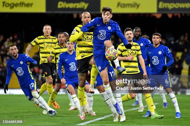Kai Havertz of Chelsea wins the ball ahead of William Troost-Ekong of Watford from a corner during the Premier League match between Watford and...