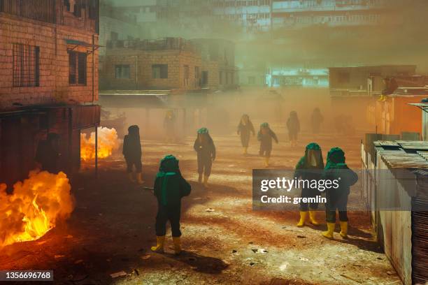 environmental disaster with hazmat team cleaning up - smoke rubble stock pictures, royalty-free photos & images