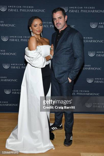 Kat Graham and Darren Genet attend the American Friends of the Israel Philharmonic New York Gala at The Morgan Library on December 01, 2021 in New...