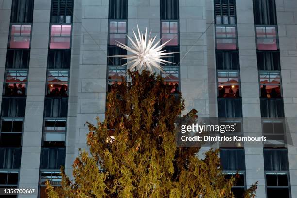 View of the star on top of the tree during the Rockefeller Center Christmas Tree Lighting Ceremony on December 01, 2021 in New York City.