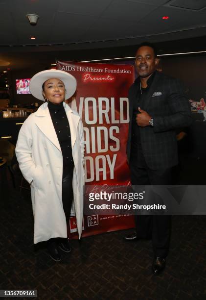 Lynn Whitfield and Lamman Rucker attend the AHF World AIDS Day 2021 concert at The Forum on December 01, 2021 in Inglewood, California. AIDS...