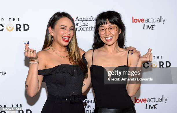 Actresses Janel Parrish and Alice Lee attend the opening night of "Love Actually Live" at the Wallis Annenberg Center for the Performing Arts on...