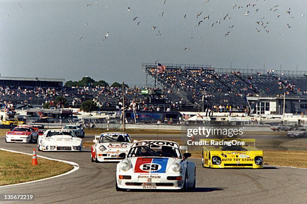 February 4-5, 1994: Infield road course action at Daytona International Speedway during the Rolex 24 at Daytona has the No. 59 Brumos Racing Porsche...