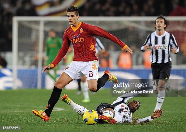 Erik Lamela of AS Roma and Elia Eljero of FC Juventus in action during the Serie A match between AS Roma and Juventus FC at Stadio Olimpico on...