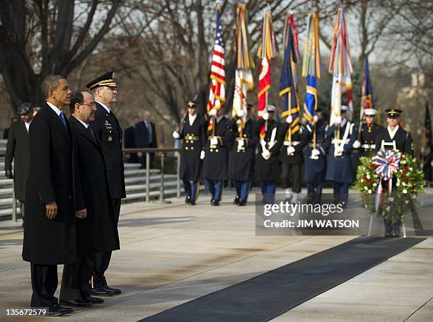 President Barack Obama and Iraqi Prime Minister Nouri al-Maliki lay a wreath at the Tomb of the Unknown Soldier at Arlington National Cemetery in...