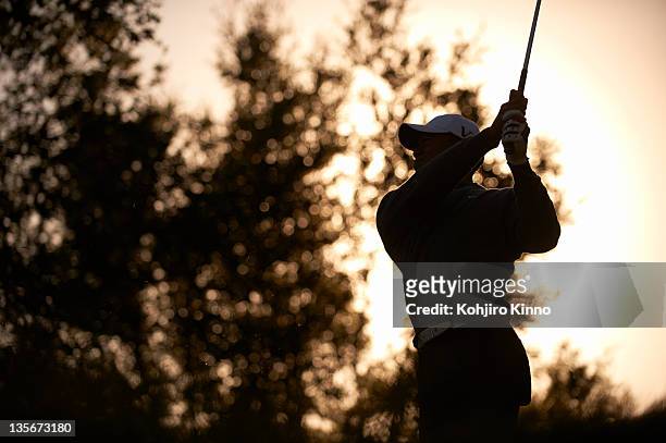 Chevron World Challenge: Silhouetted view of Tiger Woods in action, teeing off during Saturday play at Sherwood CC. Thousand Oaks, CA 12/3/2011...