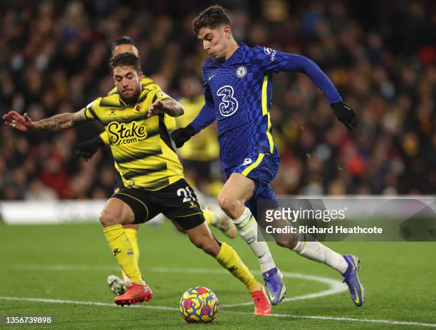 Kai Havertz of Chelsea takes on Kiko Femenía of Watford during the Premier League match between Watford and Chelsea at Vicarage Road on December 01,...