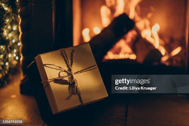 vintage christmas gift. - fireplace christmas stock pictures, royalty-free photos & images