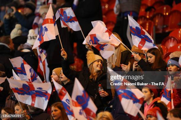 England fans wave flags ahead of the FIFA Women's World Cup 2023 Qualifier group D match between England and Latvia at on November 30, 2021 in London...