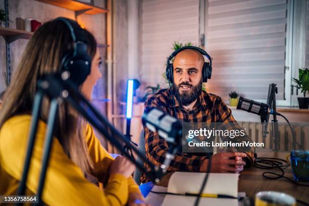 colleagues recording podcast together - radio host stock pictures, royalty-free photos & images