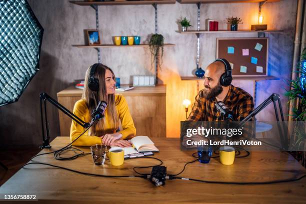 radio host and guest recording interview - radio host stock pictures, royalty-free photos & images