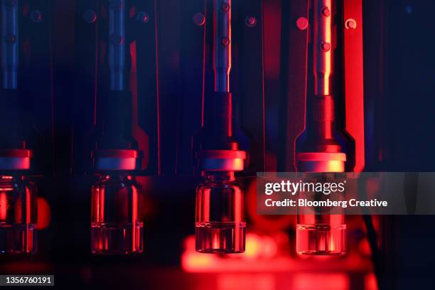 covid-19 vaccine - vaccine manufacturing stock pictures, royalty-free photos & images