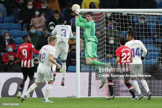 Goalkeeper Thibaut Courtois of Real Madrid CF stops the ball during the La Liga Santander match between Real Madrid CF and Athletic Club at Estadio...