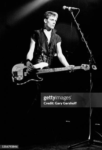 British Punk musician Paul Simonon, of the group the Clash, plays bass guitar as he performs onstage at the Capitol Theatre, Passaic, New Jersey,...